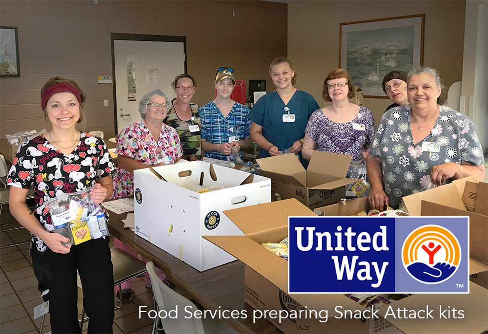 Food Services preparing Snack Attack kits